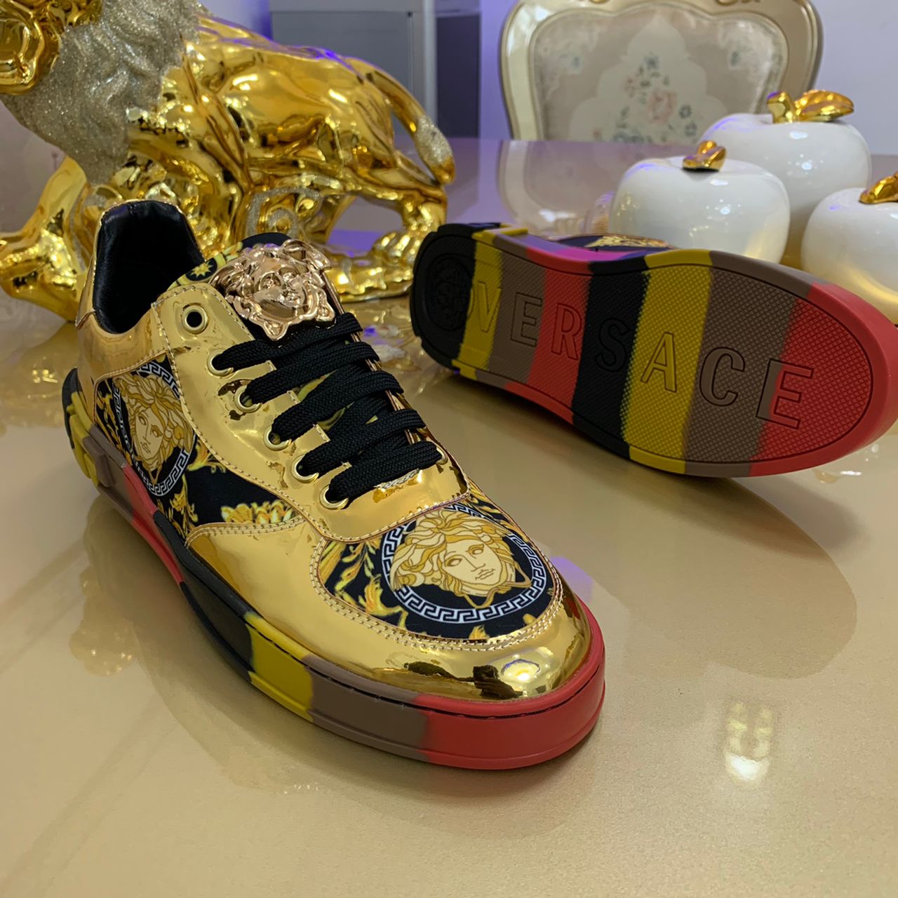 gold designer sneakers